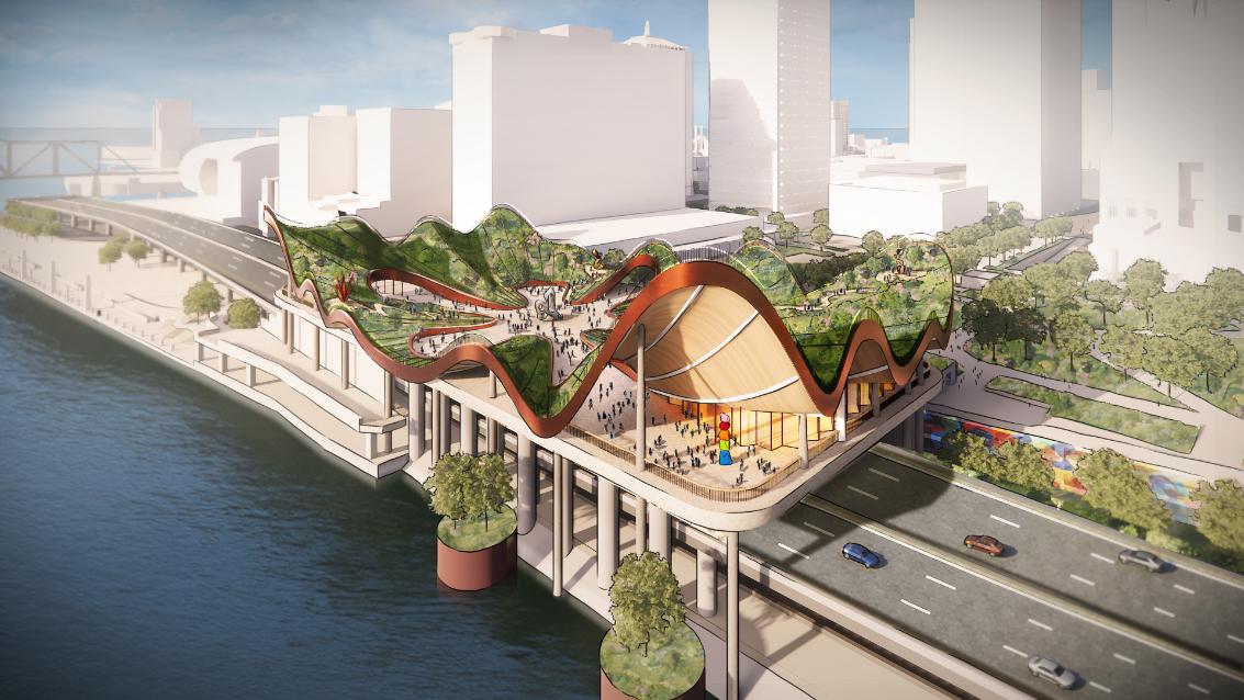 Vibrant modern architectural design of a waterfront building with green rooftop gardens and curved structural elements.