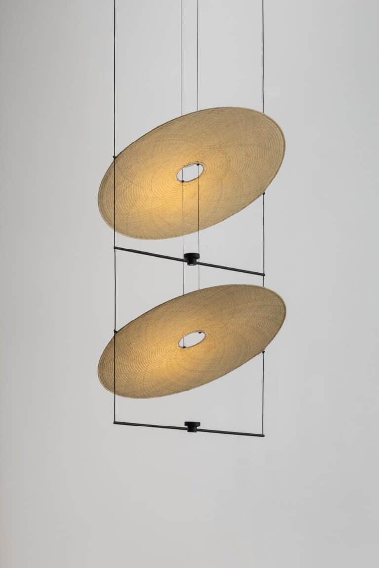 Cilia Pendant by David Pompa: A dialogue between craftsmanship and contemporary form Ceiling pendant light with woven shades and modern black metal design.