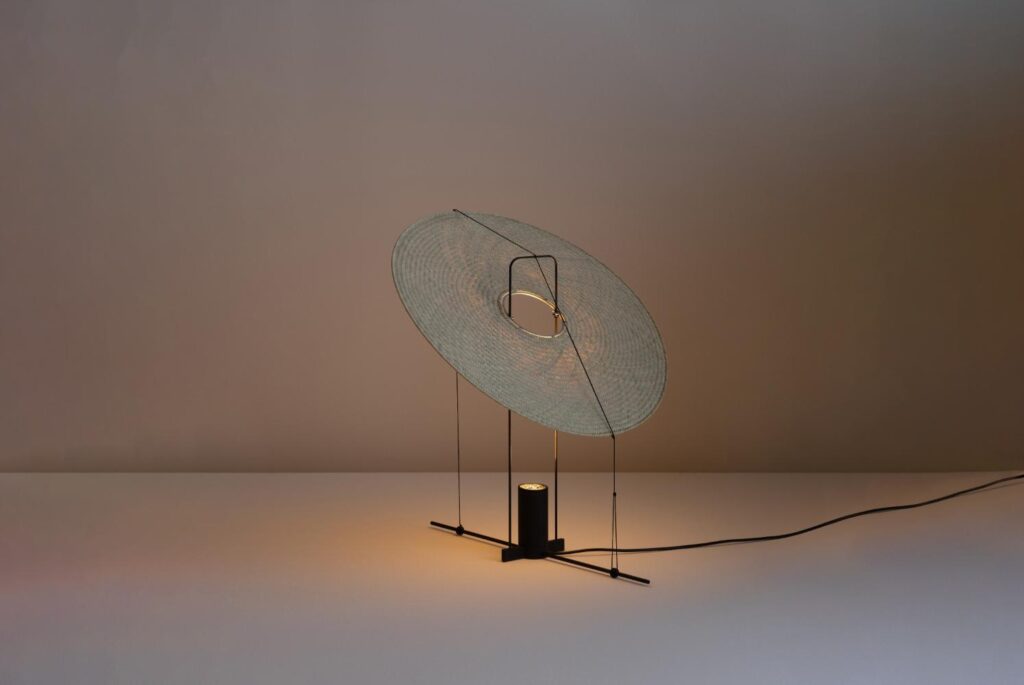 inimalist lighting piece with palma shade and aluminium support structure