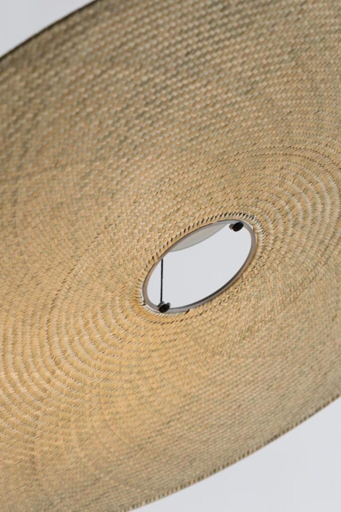 Close-up of Cilia Pendant showing detailed palm fiber weaving craftsmanship