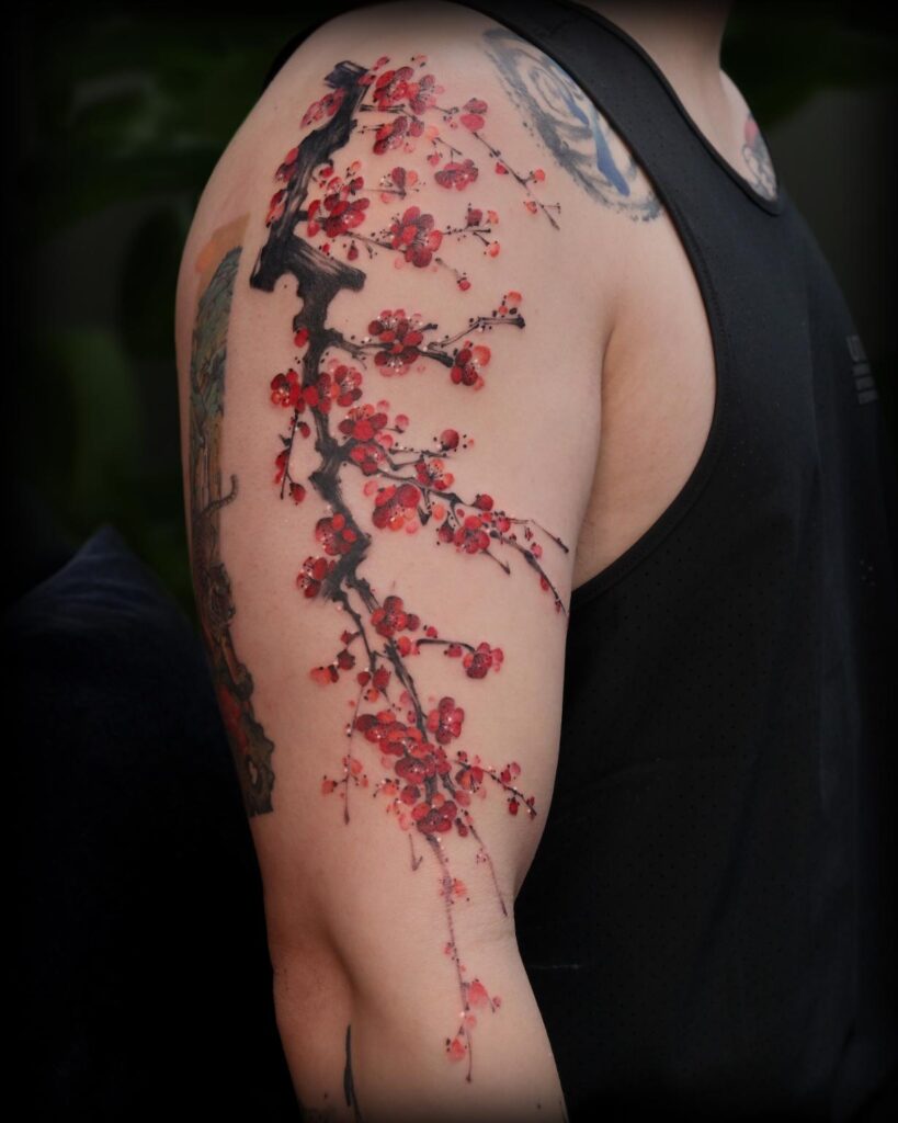 Traditional Chinese ink-inspired tattoo designed by Yicheng Zhu combining heritage aesthetics with modern body art