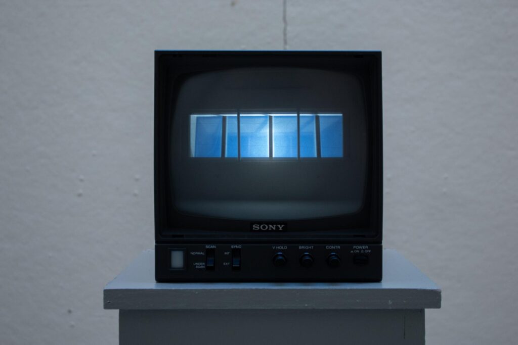 Installation view of Tele-Sky Unplugged showing the analog TV set placed outdoors under open sky
