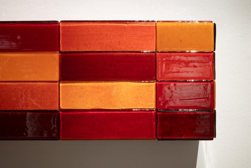 The tiles were used to clad a series of furniture
