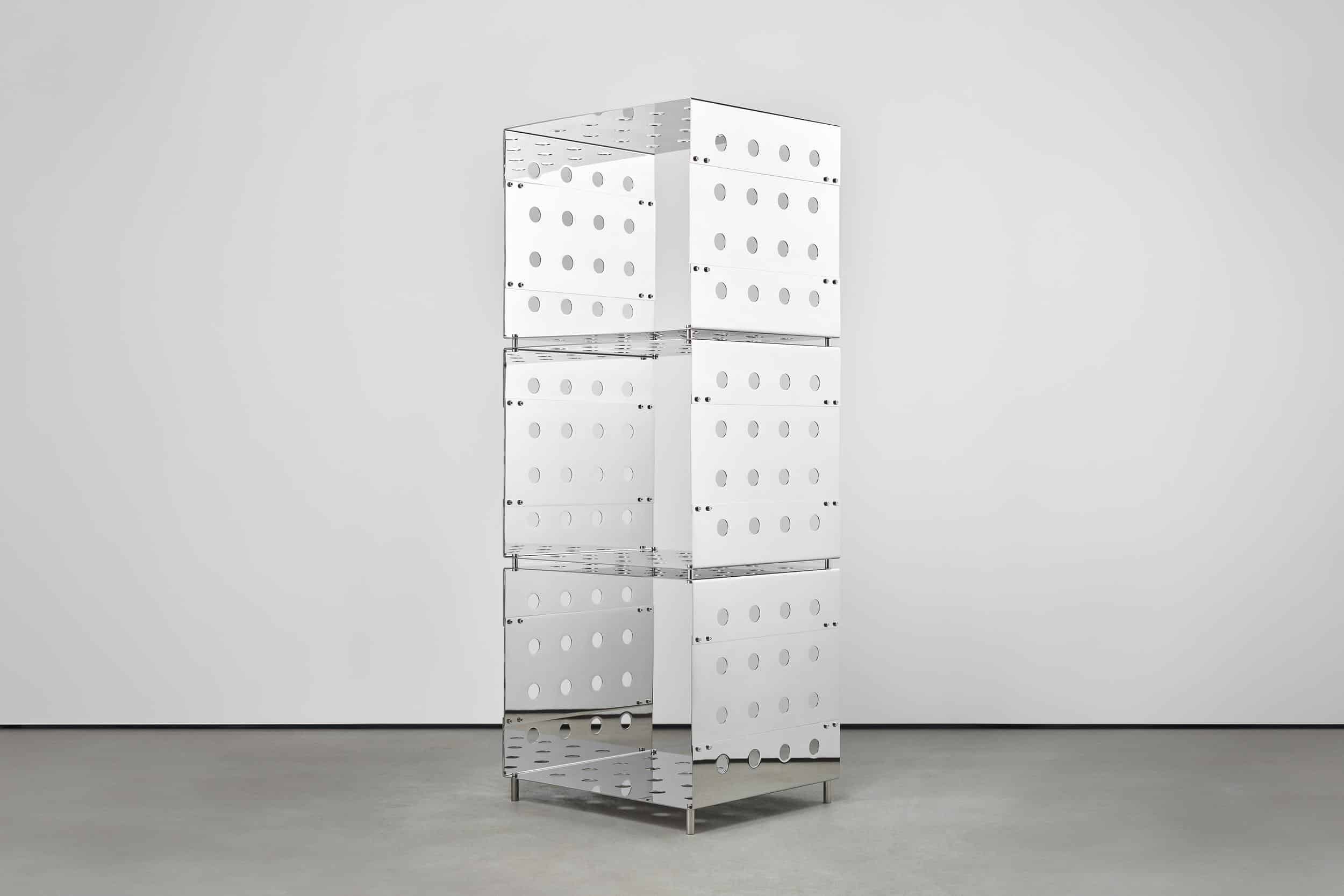 Sleek modern stainless steel shelving unit with circular cutouts, minimalist design, perfect for contemporary interiors.
