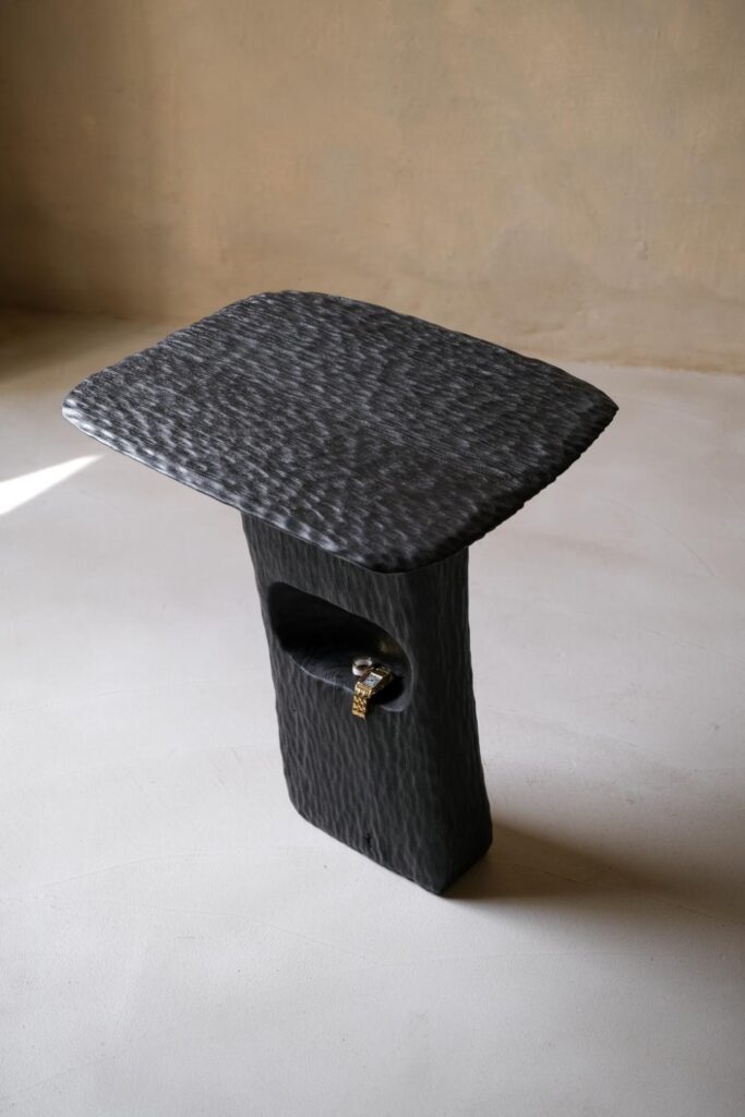 Detailed view of the brushed grain texture on charred oak from the Youtopia furniture line