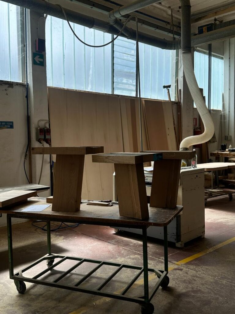 European oak sculpted into raw, tactile surfaces in Youtopia furniture collection display