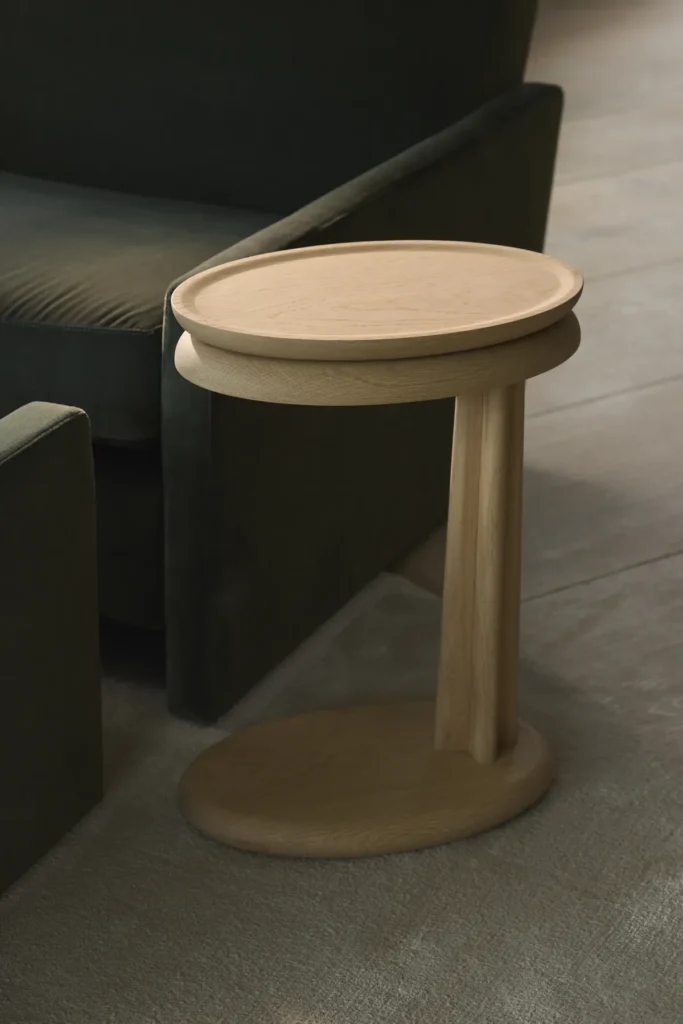 Handmade black oak side table from Filip Tack’s Più objects collection