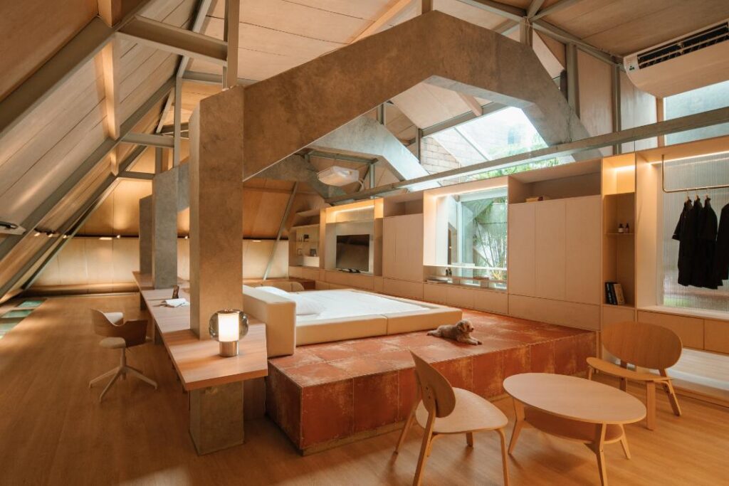 Birch plywood ceiling highlighting warm attic interior