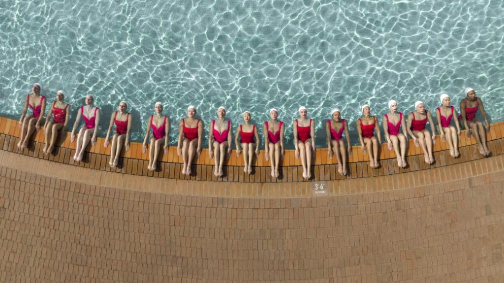 Aerial photograph by Brad Walls showcasing minimalist composition and geometric symmetry at pool