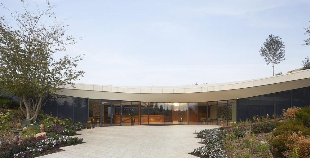 Wide terrace of Sauska Tokaj winery offering expansive views across the Tokaj wine region