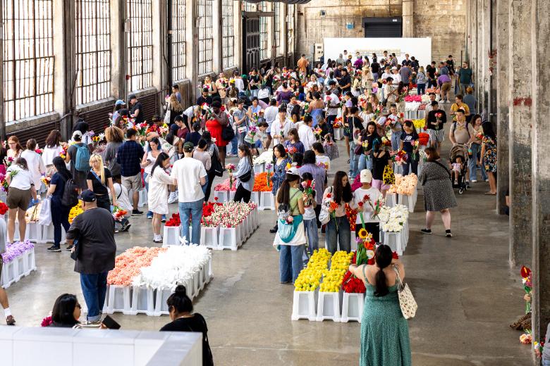 Visitors pick free plush flowers