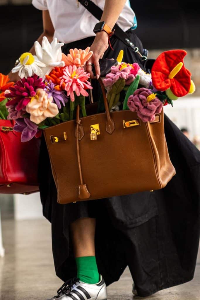 Vibrant plush flowers arranged in a bag