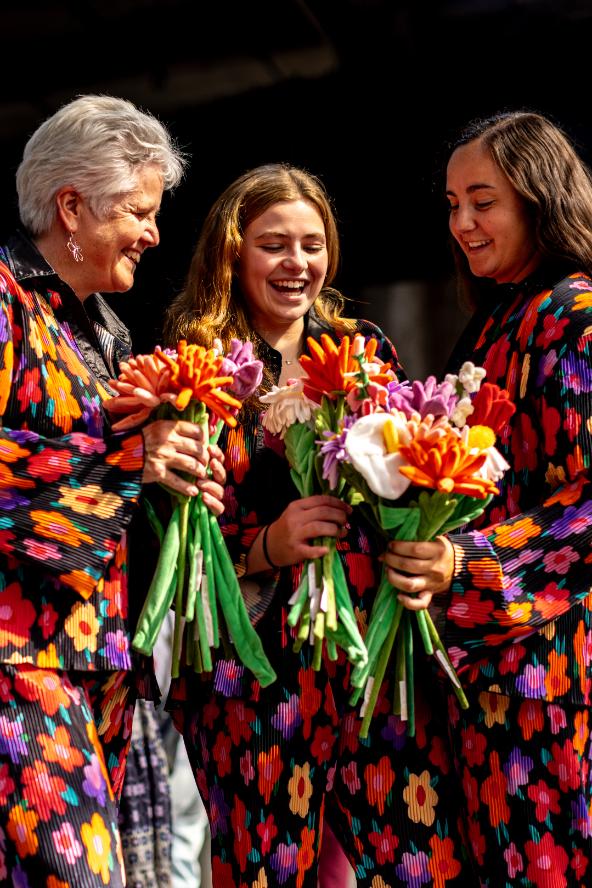 Guests being happy at the flower market event