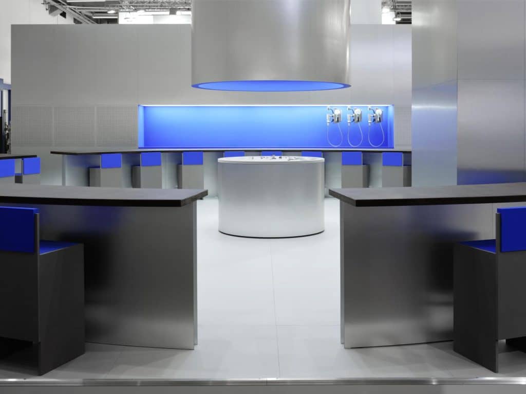 Wide exhibition view of ROUND PROBLEMS at trade fair