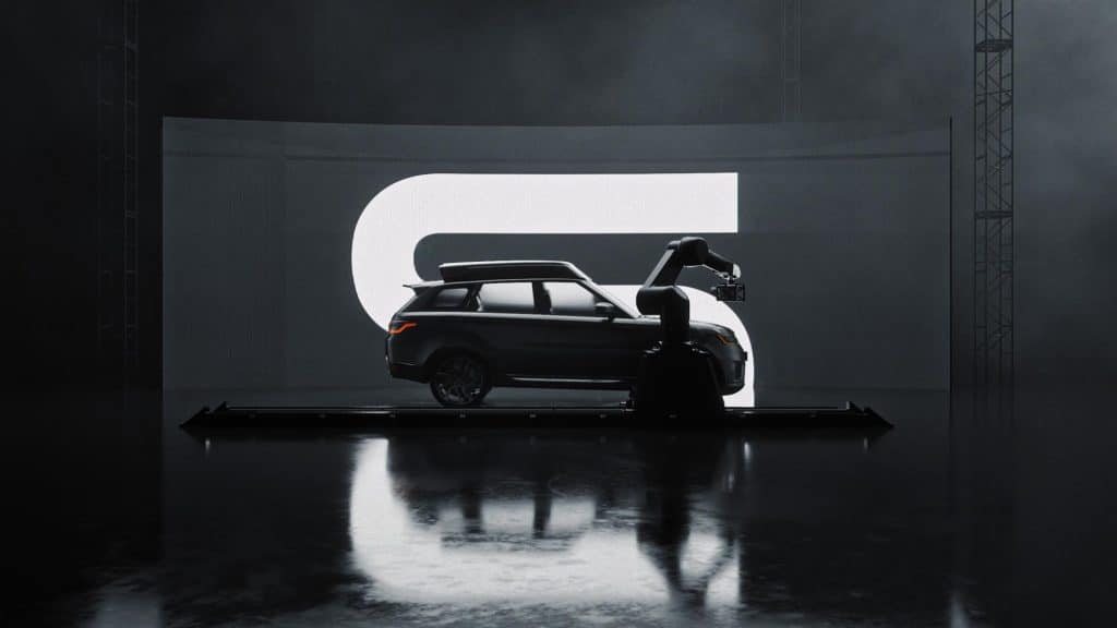 Cinematic wide shot of capsule rotating against a high-contrast backdrop