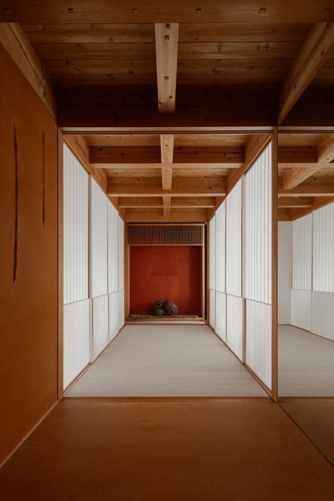 Interior view showing layered washi screens filtering soft daylight