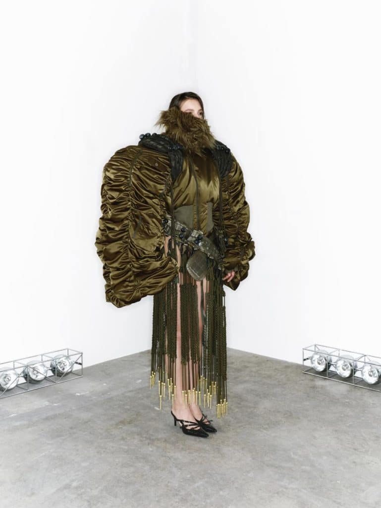 Structured and draped garment by Aojierou blending hard and soft materials