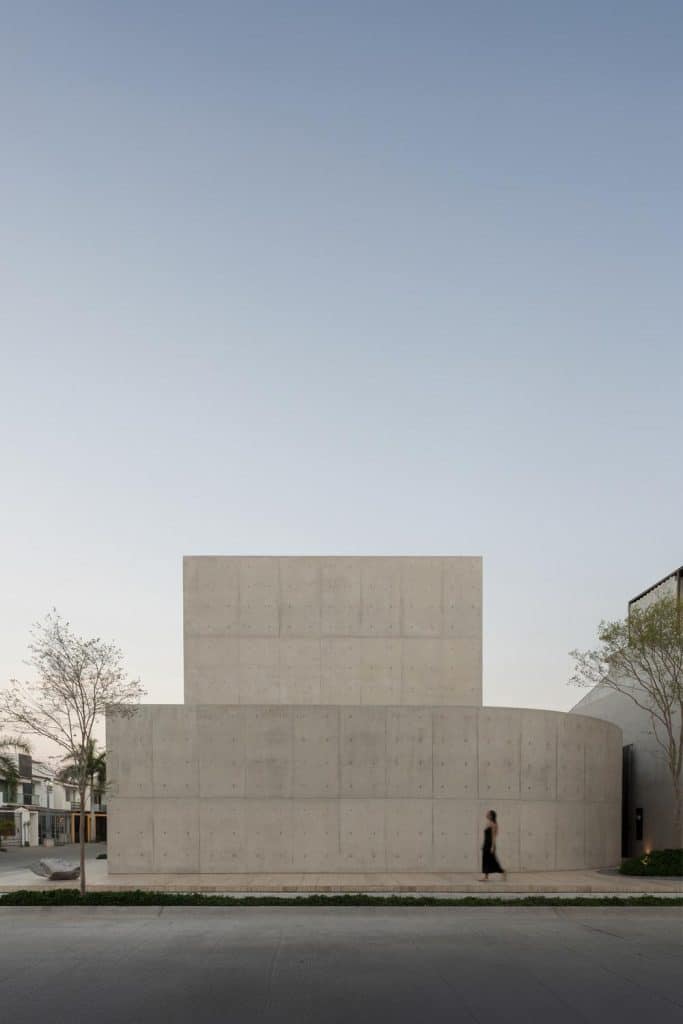 Exterior of Casa Tao showing white concrete surfaces and elevated volumes