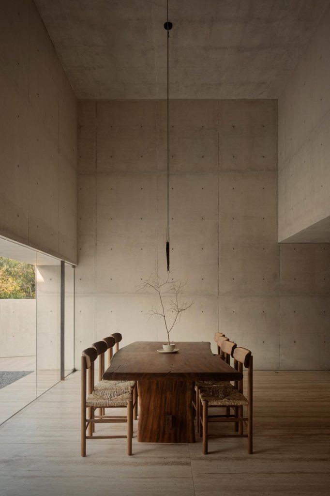 Interior space where concrete absorbs soft filtered light