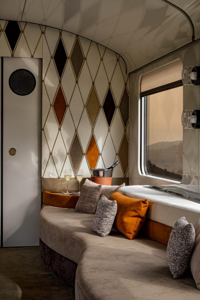 Close-up of tactile textiles and brass accents crafted by Italian artisans
