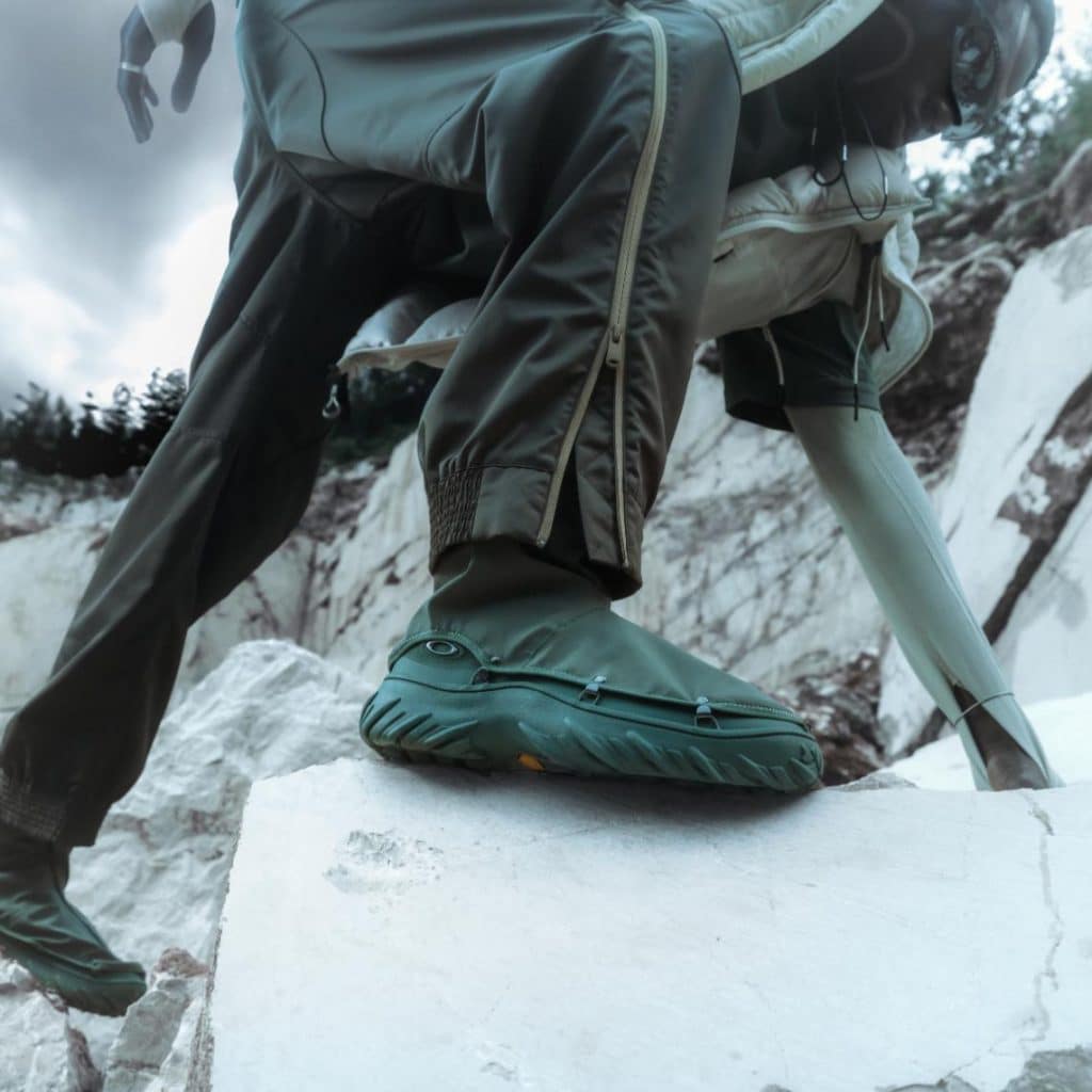Oakley Meridian Low Ext Boots photographed on rugged terrain with textured outsole