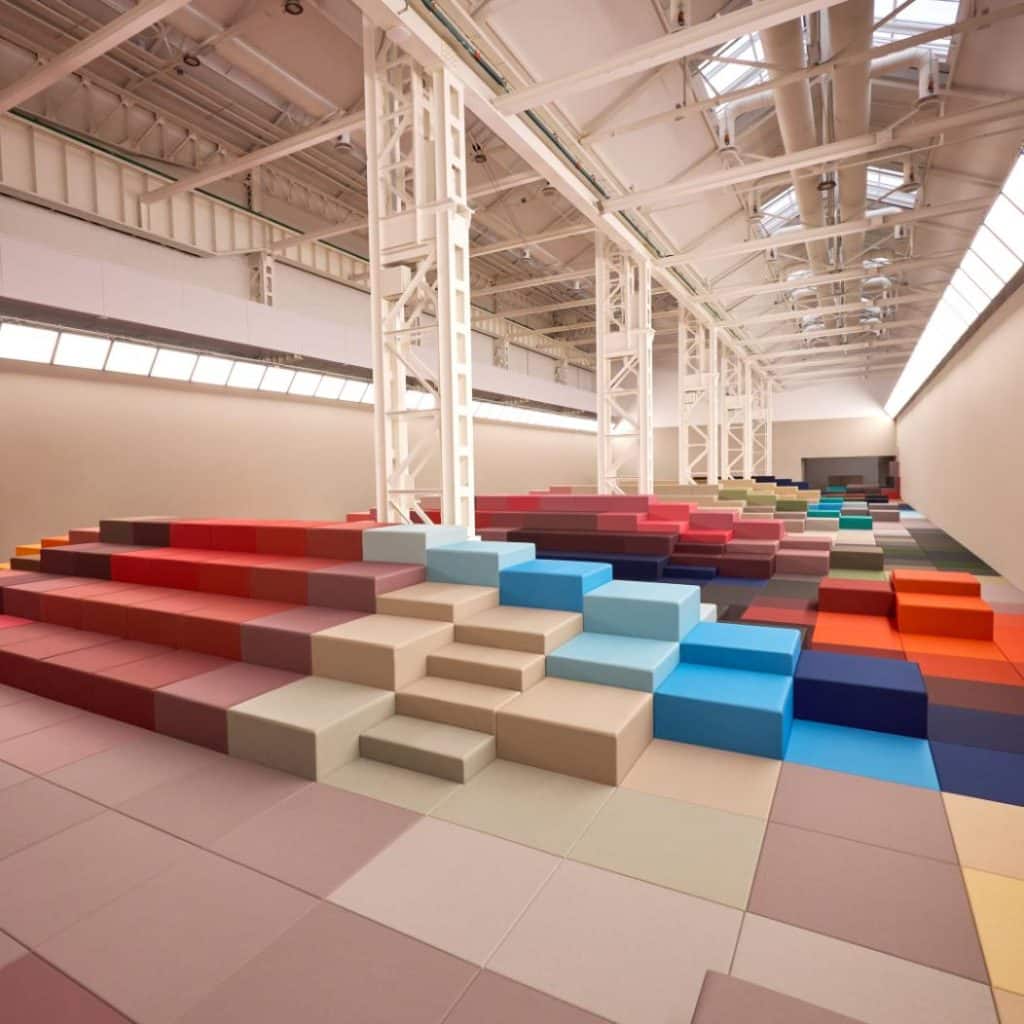 Geometric quilt-like runway set designed by Marc Newson for FENDI SS26