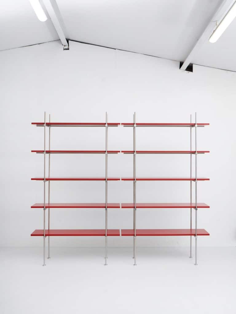Frederik Fialin designs modular Spaghetti Shelf System for adaptable interiors Two separate shelf sections forming a low horizontal arrangement against a wall
