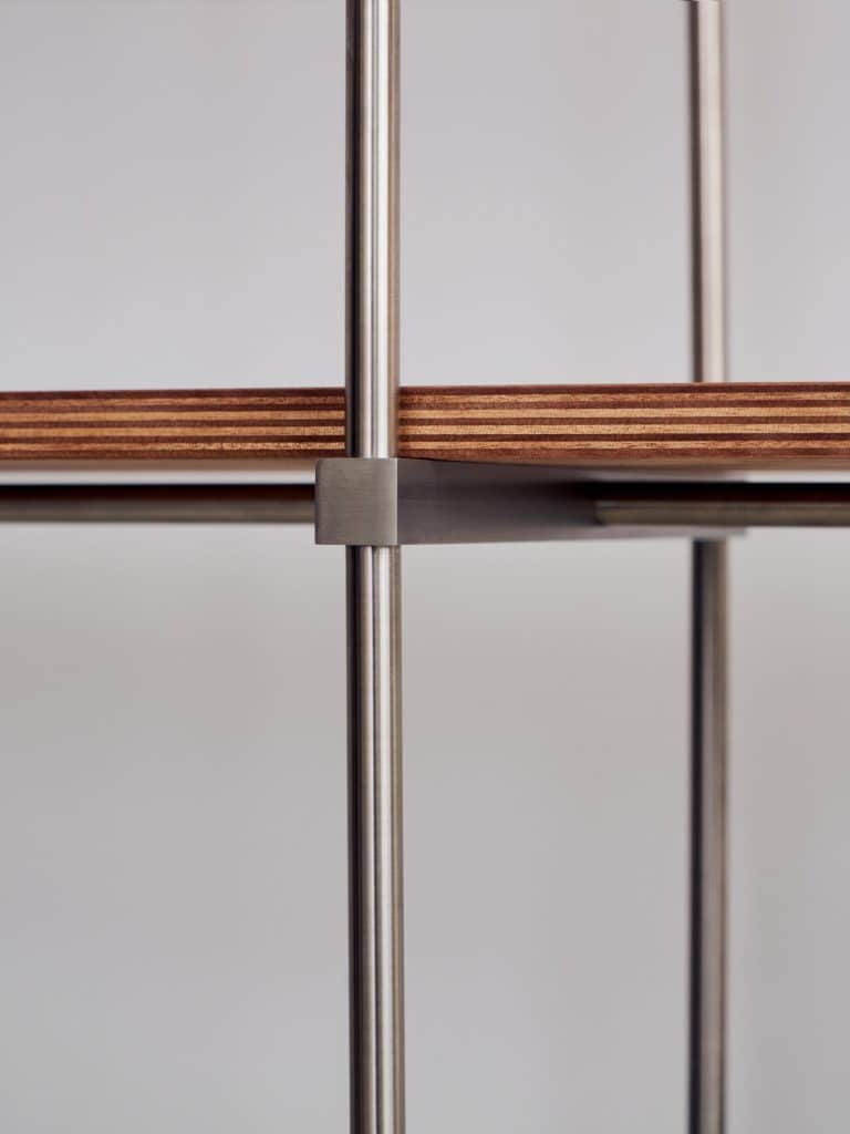 Detail view showing the connection points between rods and polyethylene shelves