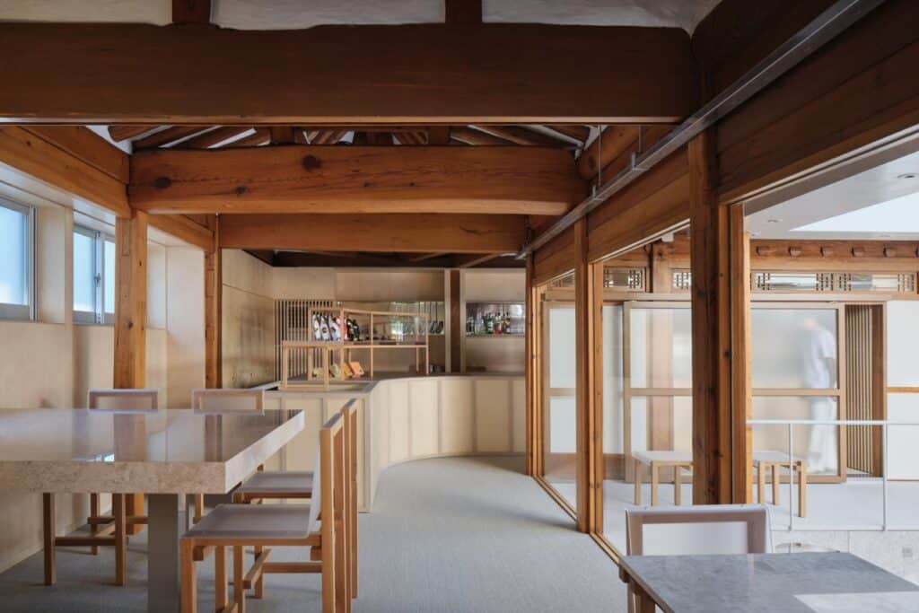 Acrylic and wood bar interior of Café Cordialement with soft lighting