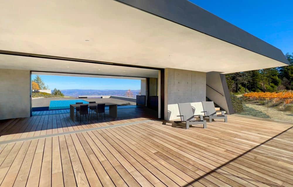 Poolside terrace with basalt pavers near the main house