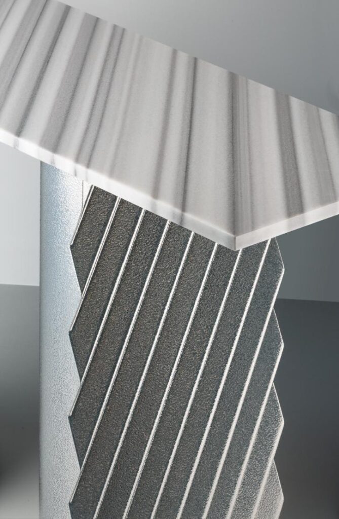 Detail of folded sheet metal structure highlighting material precision