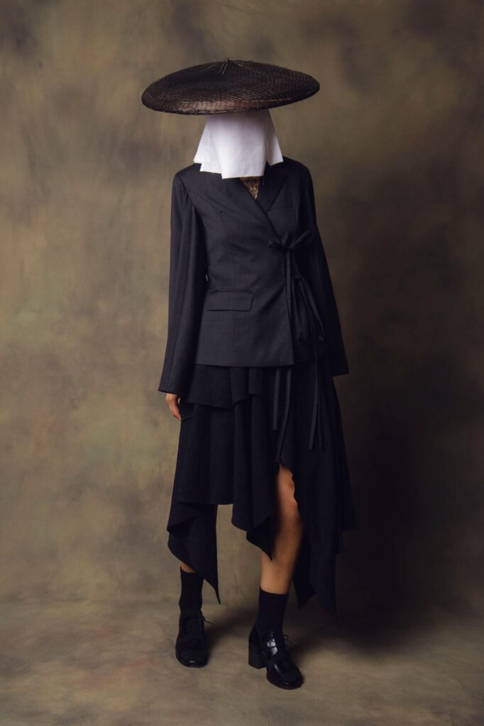 Soft lighting emphasizing folds and layered proportions