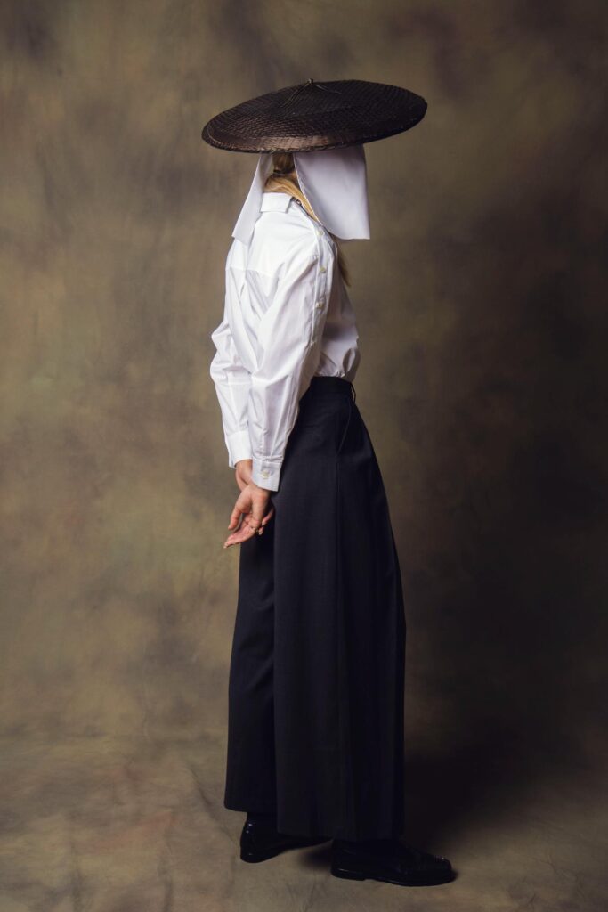 Full-length look capturing balance between stillness and form