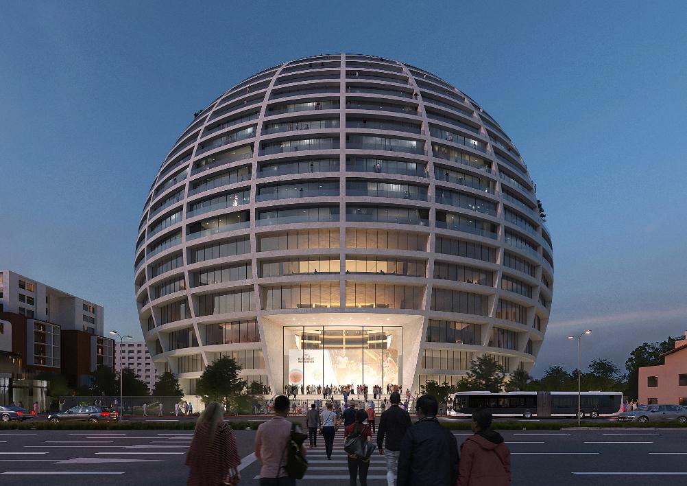 Exterior view of The Grand Ballroom spherical building rising above Tirana
