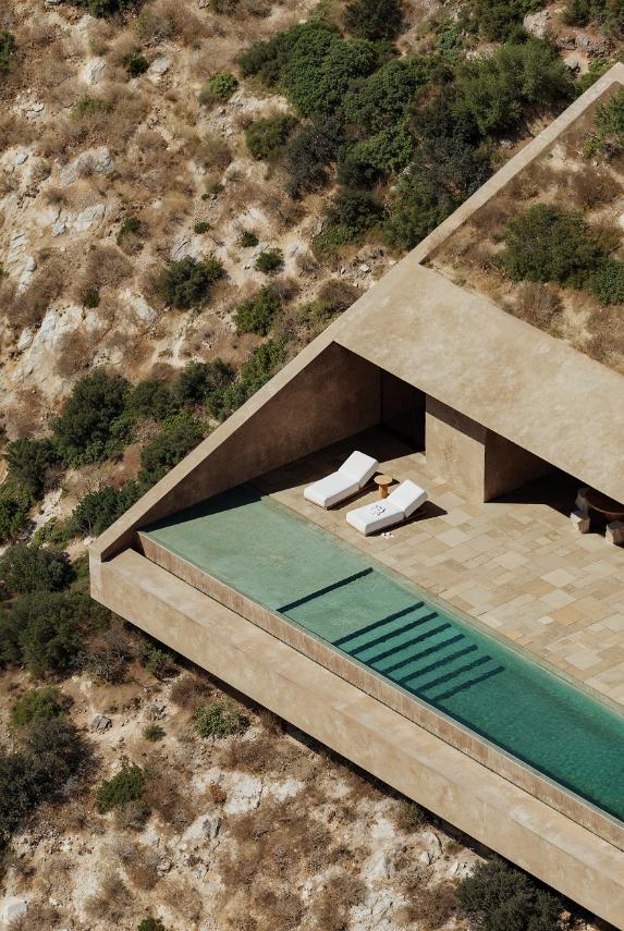 Signature Villa by Oppenheim Architecture rises from the cliffs of Jalë Bay -