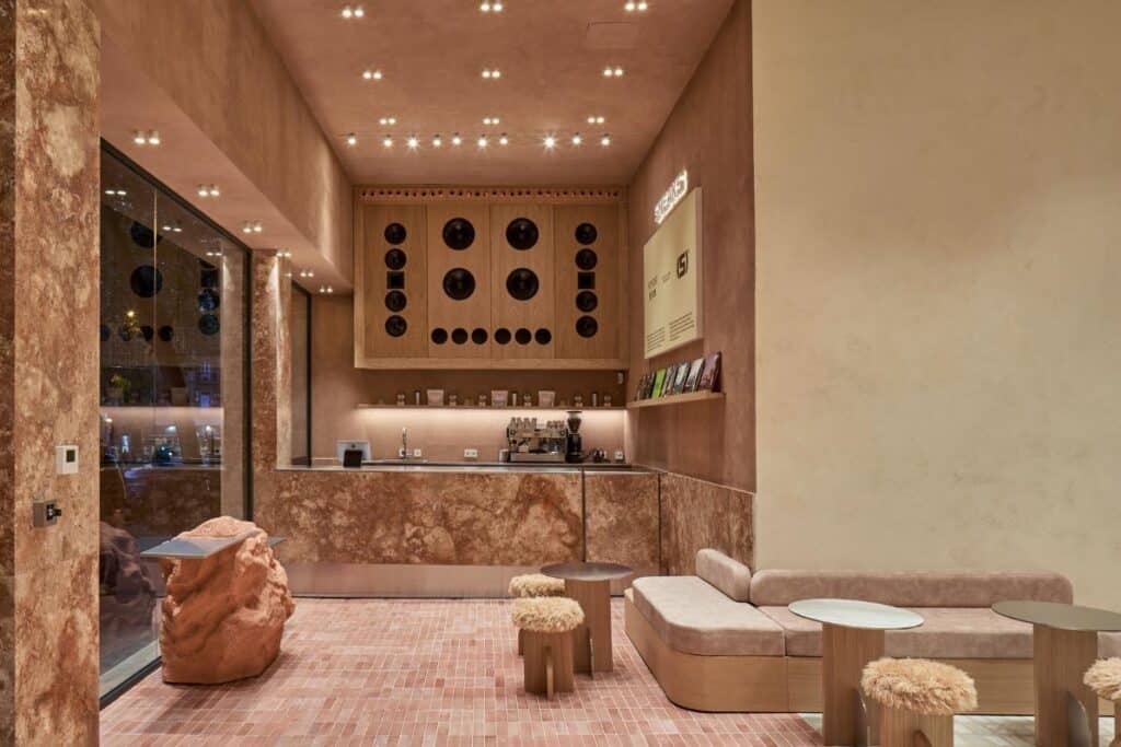 Pink marble café area with handcrafted clay tiles