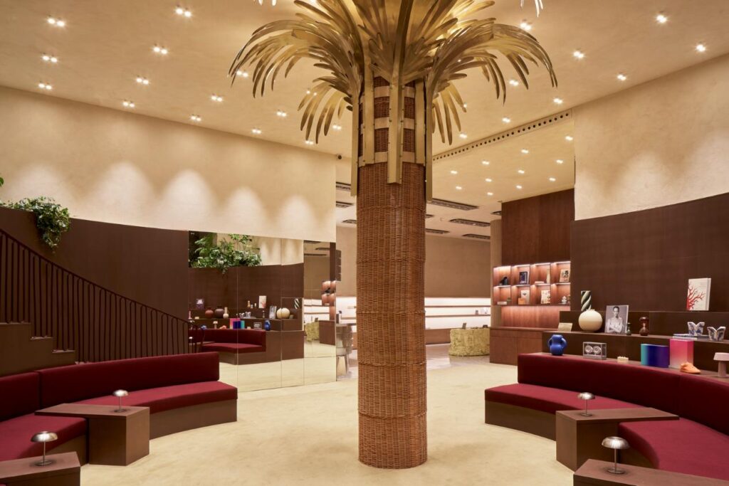 Custom terrazzo flooring defining the store’s central zone