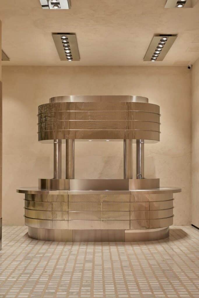 Amphitheater-style gallery with wicker and metal artwork