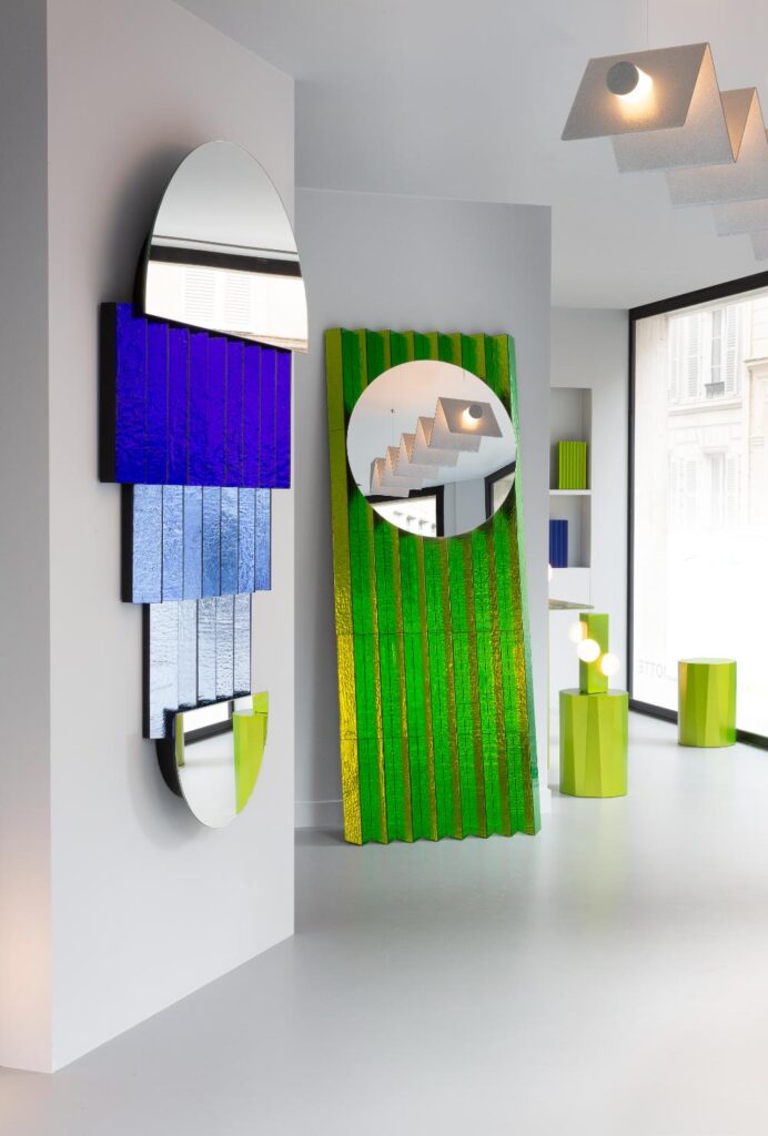 View of Colorscape exhibition displaying geometric furniture in vivid color tones