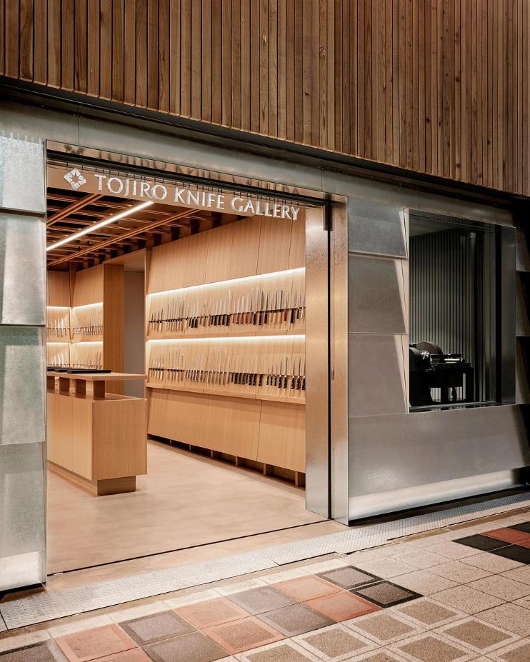 Stainless exterior meeting timber interior at the entrance threshold
