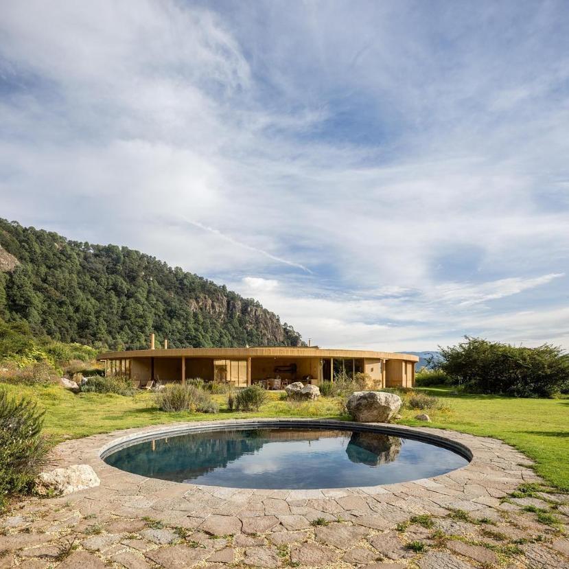 Local earth and concrete finish blending with natural terrain