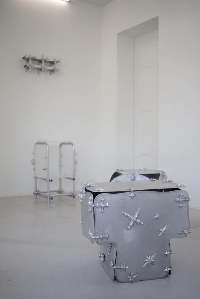 Studio installation highlighting junctions between pipes and panels