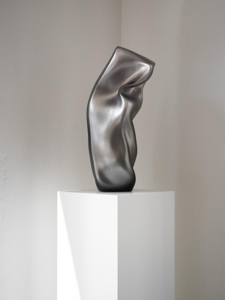 Robert Comploj reframing glass through controlled distortion -