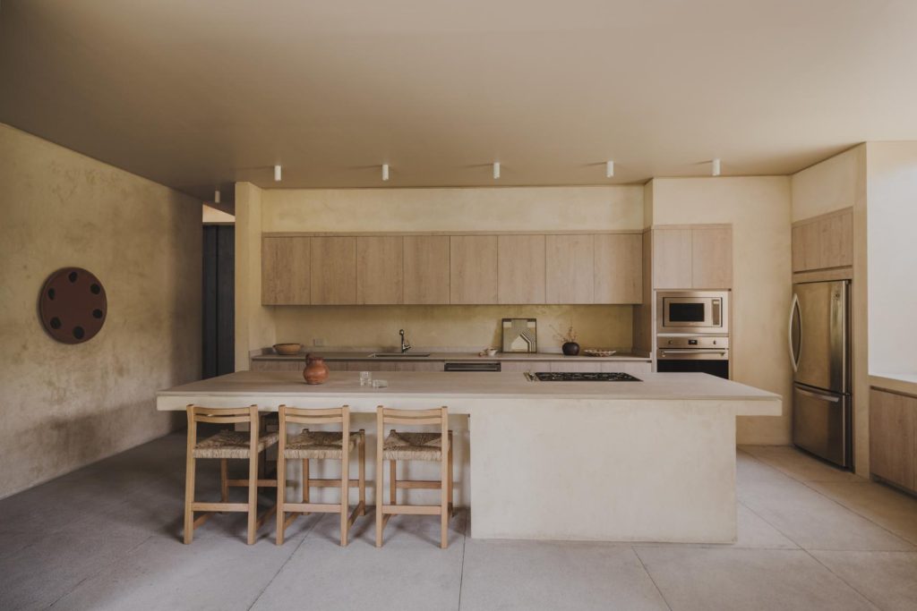 Architecture of Casa Ocote by PPAA as a serene family refuge -