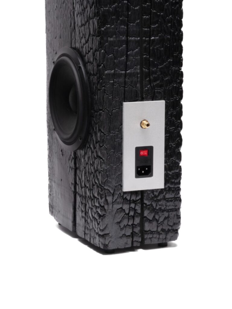 Detail of carbonized wood texture on experimental audio device