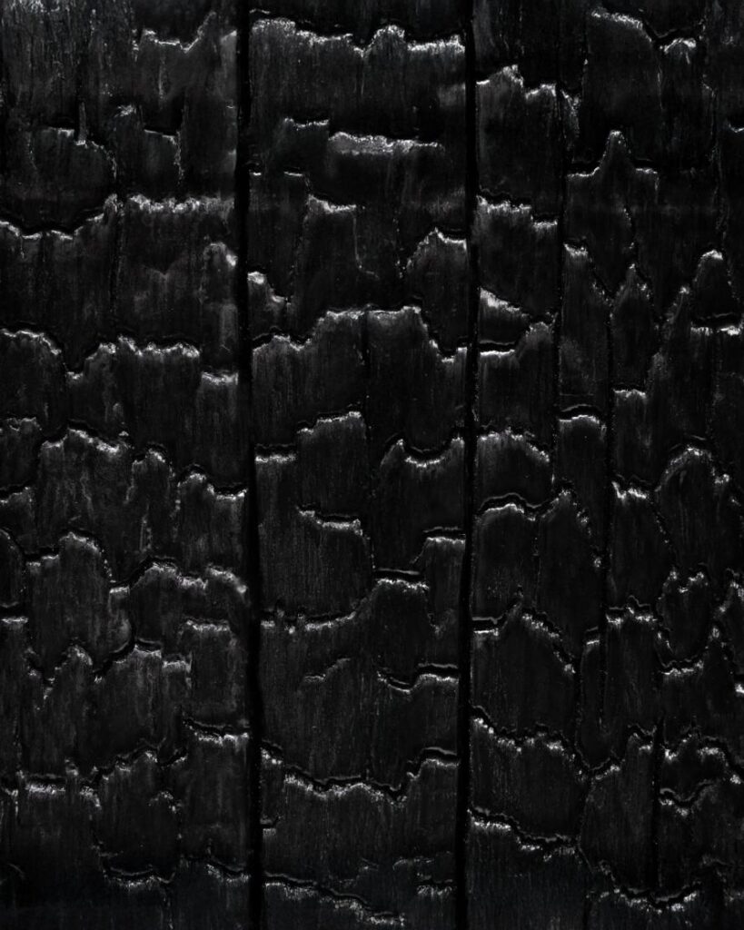 Close up of resin stabilized burnt oak grain pattern