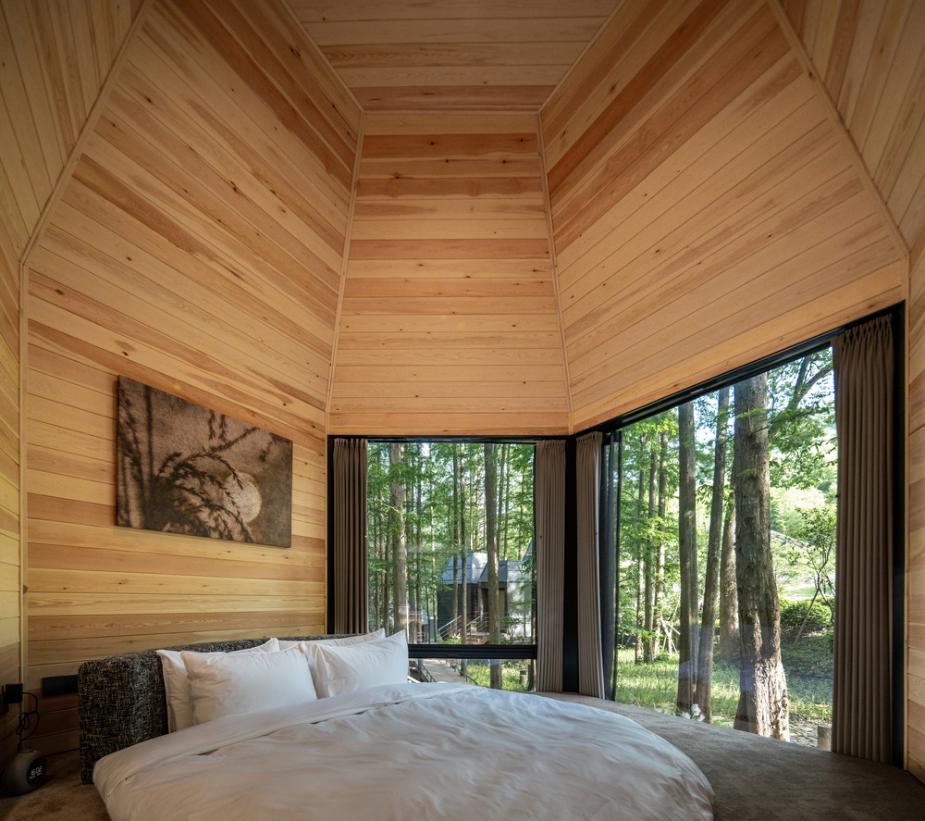 Interior of timber cabin with skylight and double pitched roof