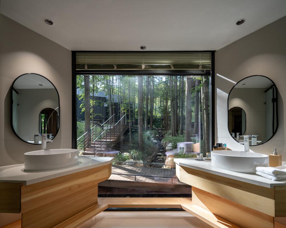GLA Architects designs Dongmingshan Senyu Hotel as a minimal forest retreat -