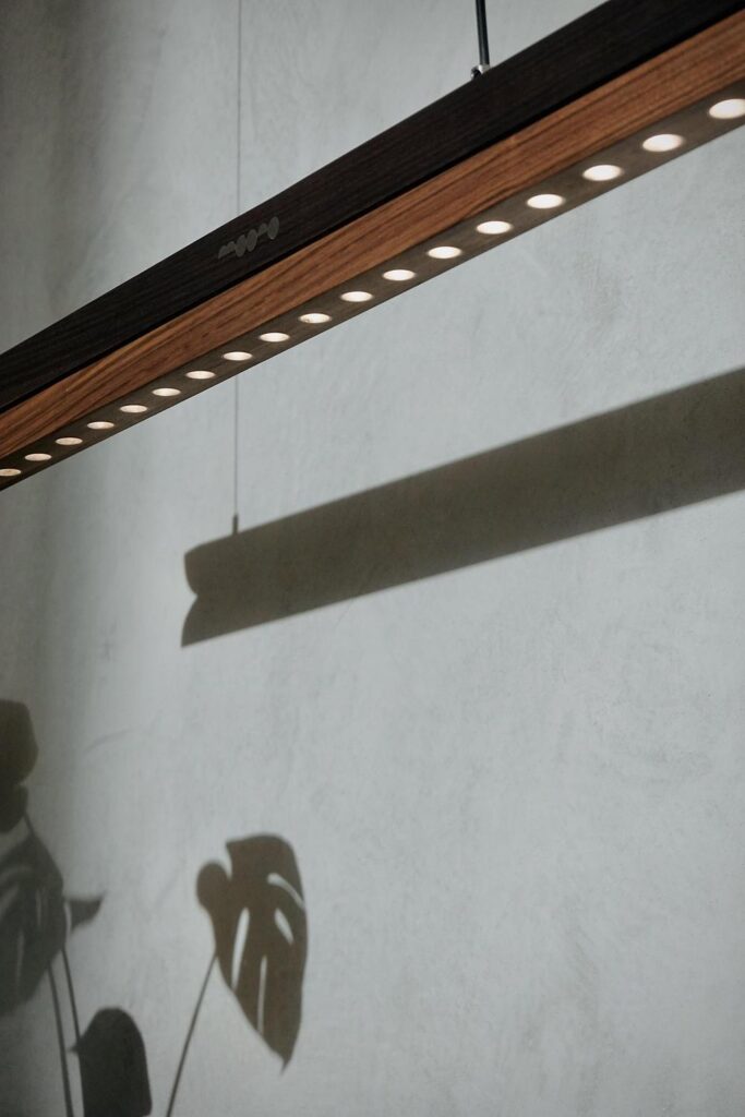Moono sliding pendant light introduces tactile lighting design -