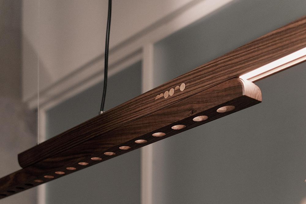 Moono sliding pendant light introduces tactile lighting design -